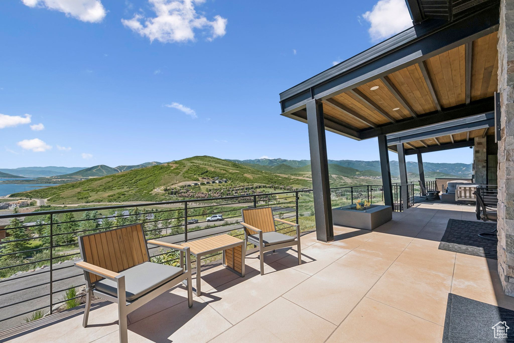 Patio / terrace featuring a mountain view