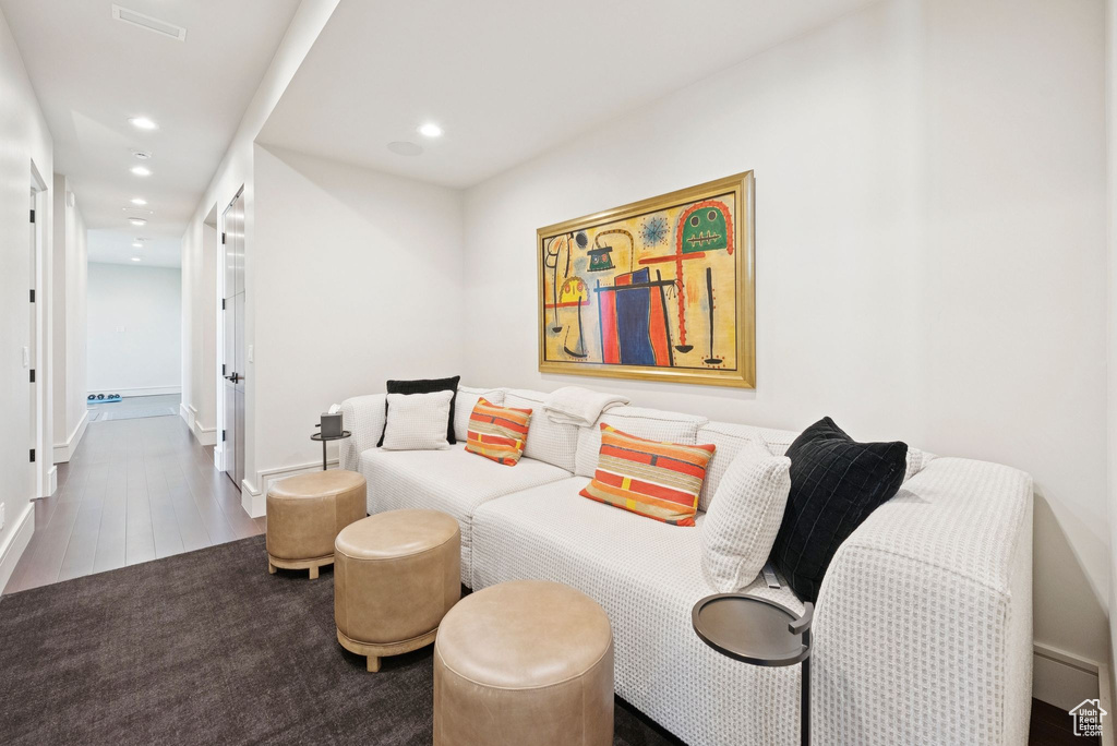 Living area featuring recessed lighting and wood finished floors