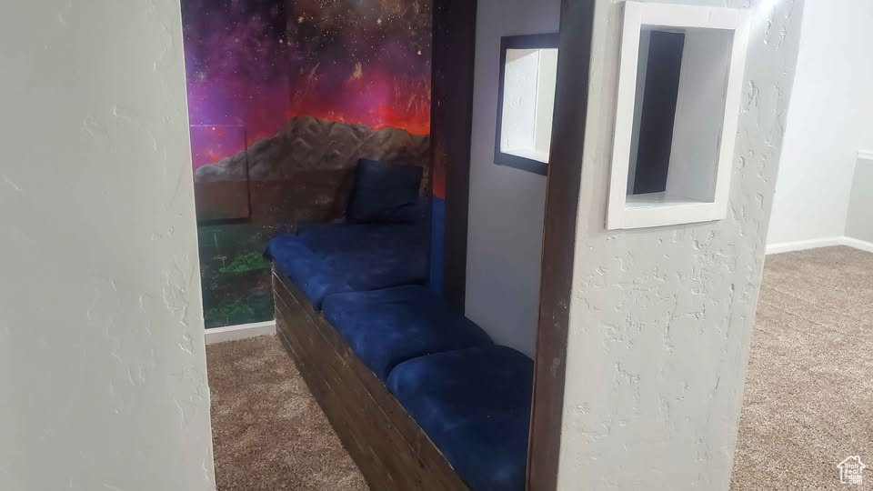 Living area with carpet flooring