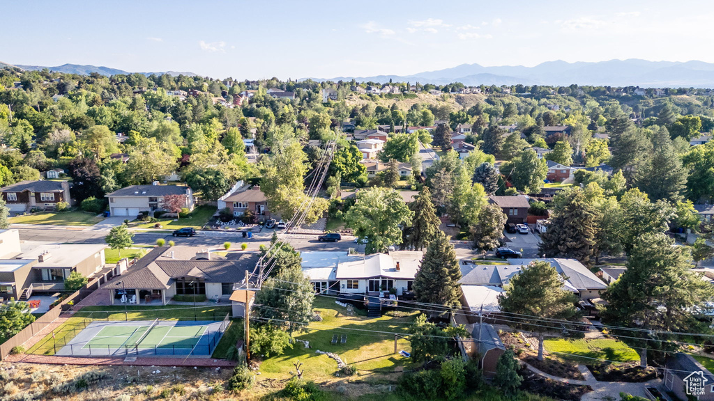 Aerial view of residential area with mountains