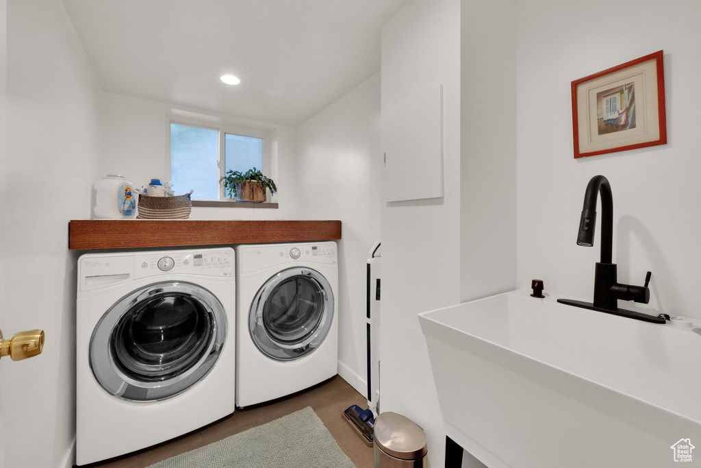 Laundry room featuring separate washer and dryer, dark wood finished floors, and recessed lighting