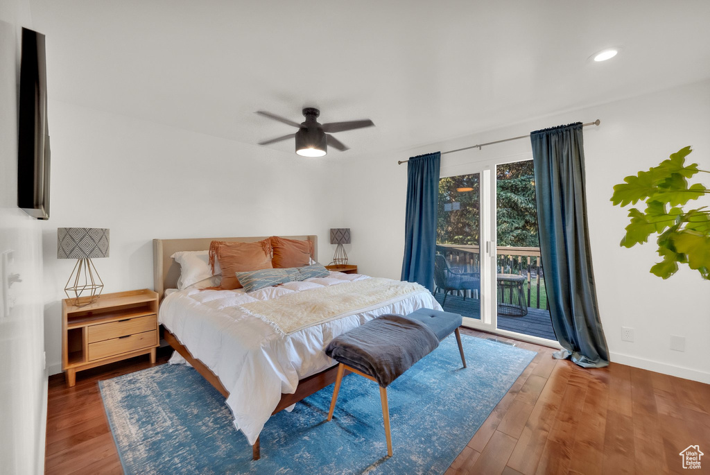 Bedroom featuring access to outside, wood finished floors, recessed lighting, and a ceiling fan