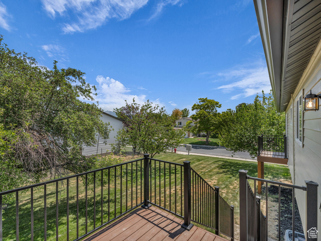 Wooden terrace with a yard