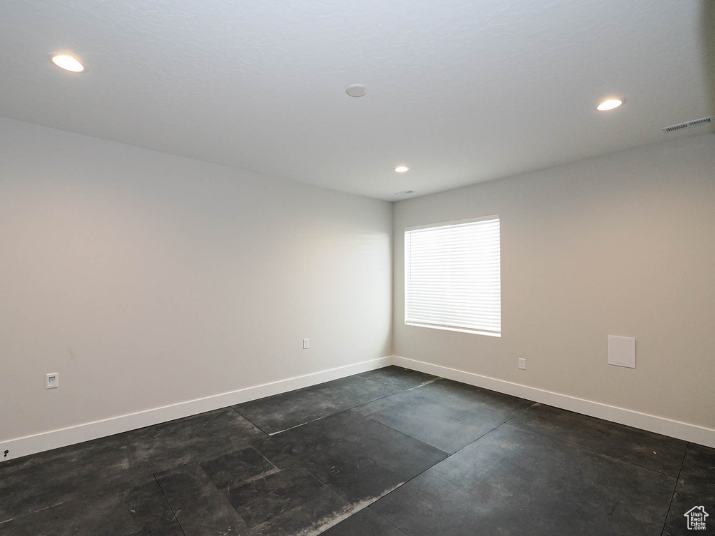 Spare room with recessed lighting