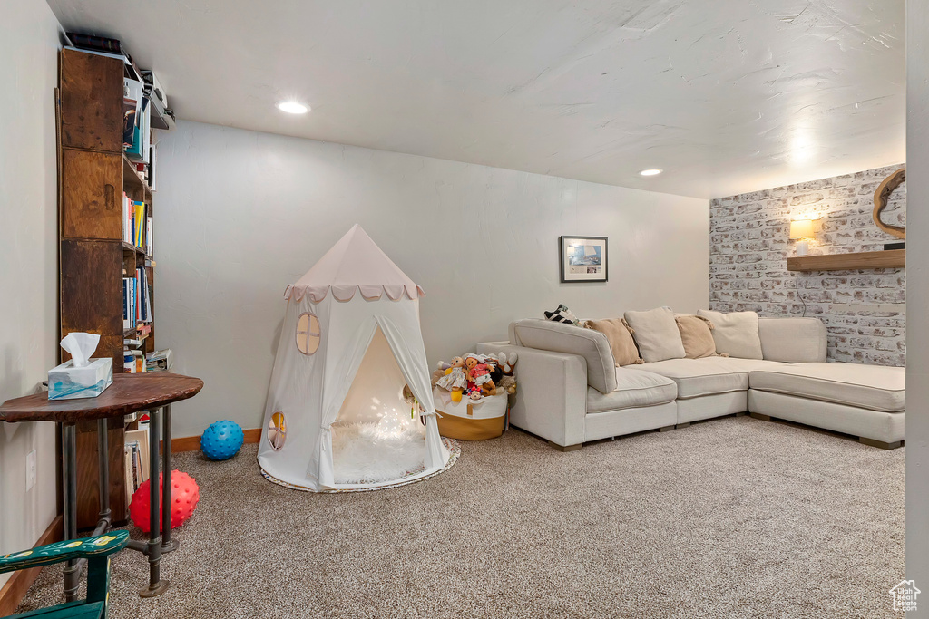 Living room featuring carpet floors and recessed lighting
