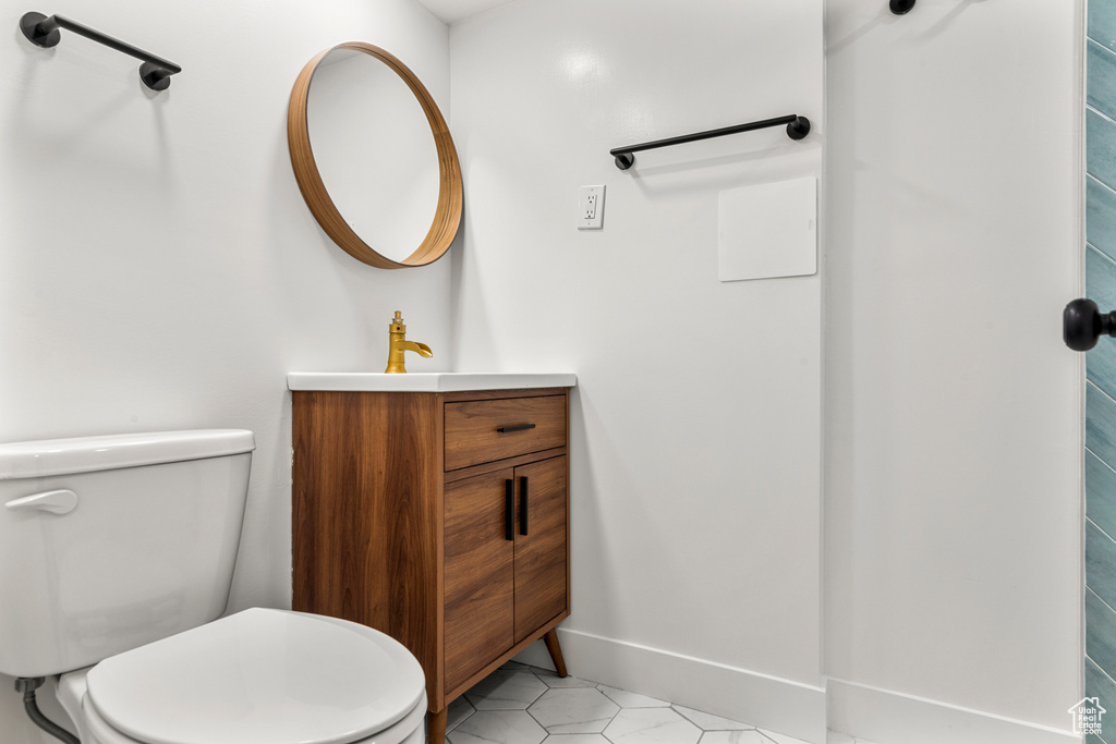 Bathroom featuring vanity and tile patterned floors