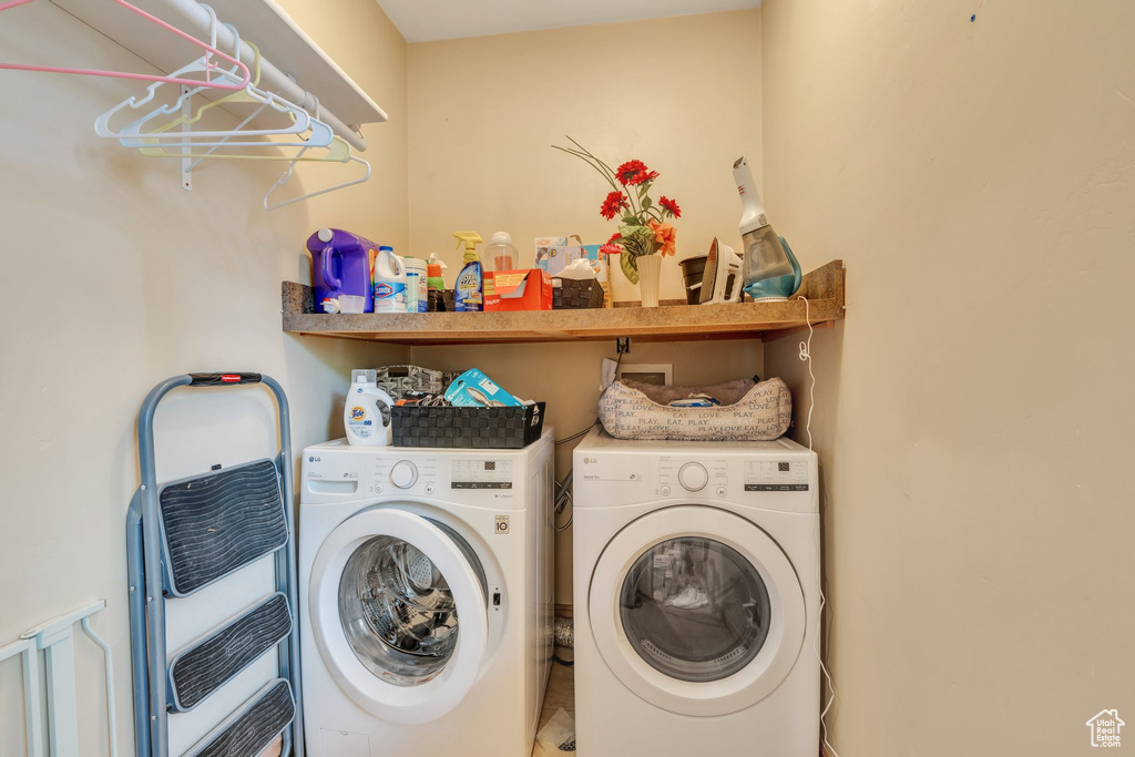Laundry area featuring separate washer and dryer