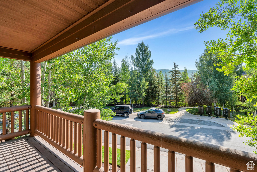 Wooden deck featuring a mountain view