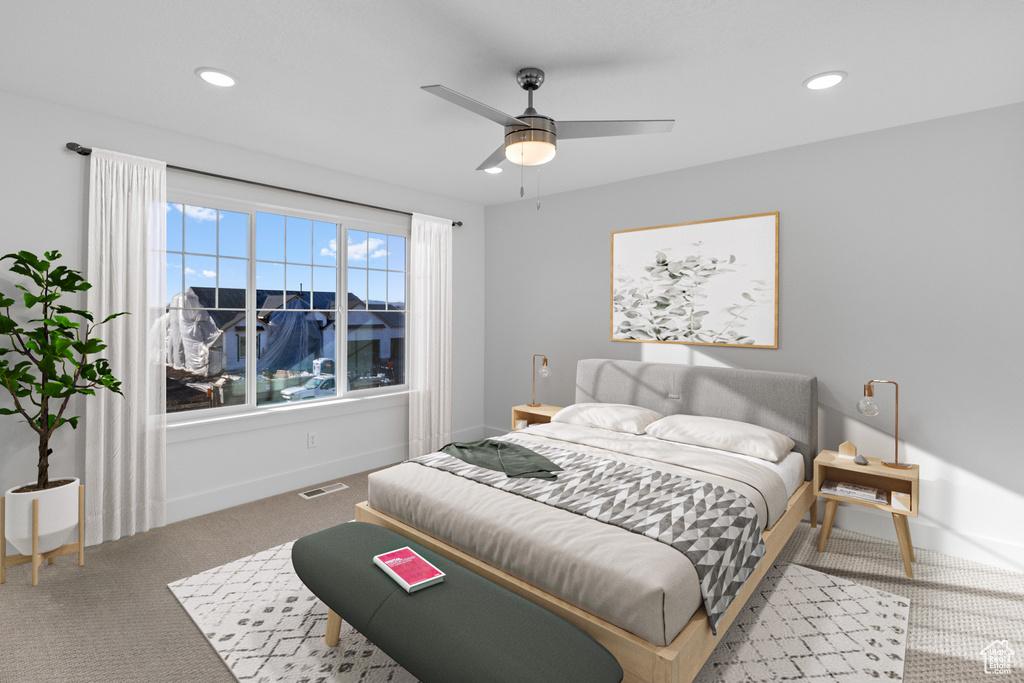 Bedroom with carpet floors, recessed lighting, and a ceiling fan