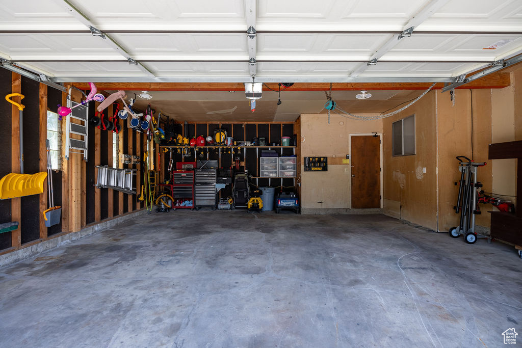 Garage featuring a garage door opener