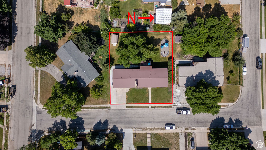 Aerial overview of property\\\\\\\'s location featuring property parcel outlined
