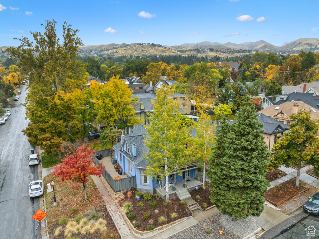 Aerial view of residential area with a mountain backdrop