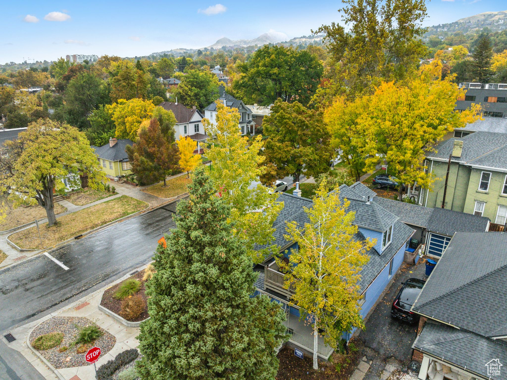 Aerial view of residential area featuring mountains