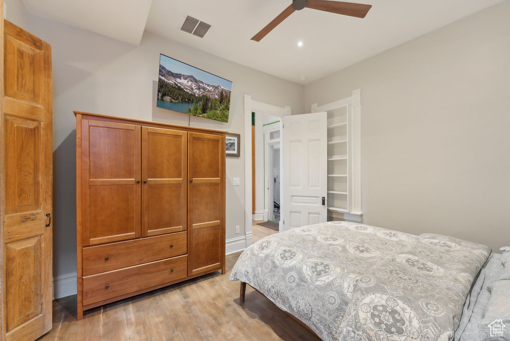 Bedroom featuring light wood finished floors, recessed lighting, and a ceiling fan