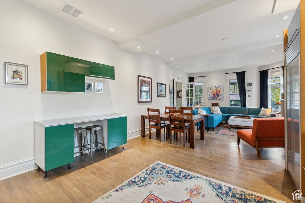 Living area featuring wood finished floors and recessed lighting