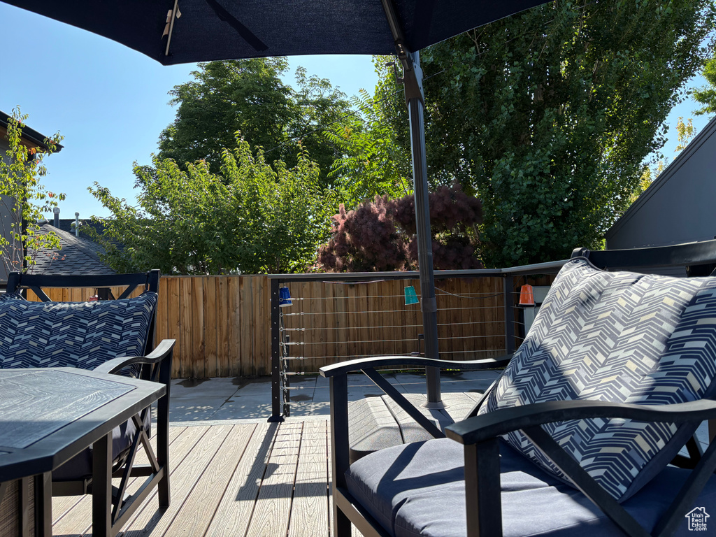 Wooden terrace with outdoor dining area