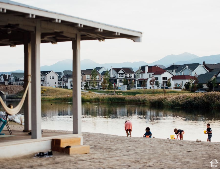 View of property's community with a residential view and a water and mountain view