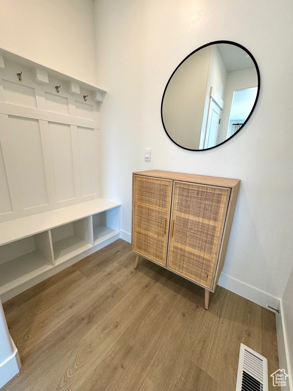 Mudroom featuring wood finished floors
