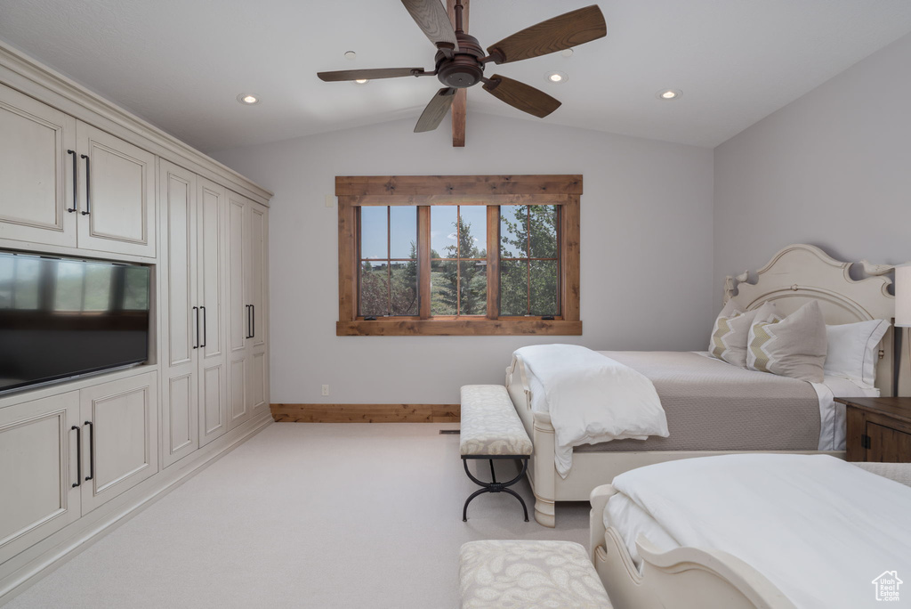 Bedroom with recessed lighting, a ceiling fan, and light carpet