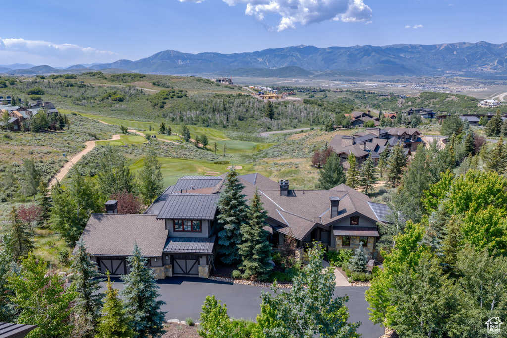 View of subject property featuring mountains