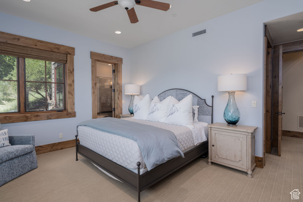 Bedroom featuring light colored carpet, recessed lighting, and a ceiling fan
