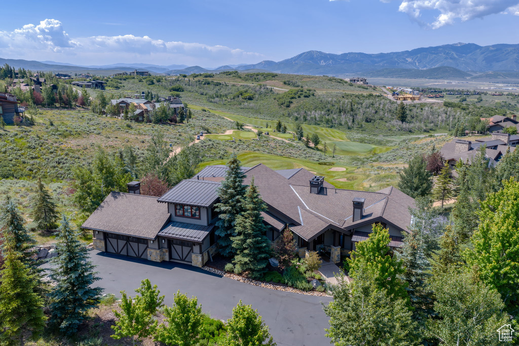 View of subject property featuring mountains