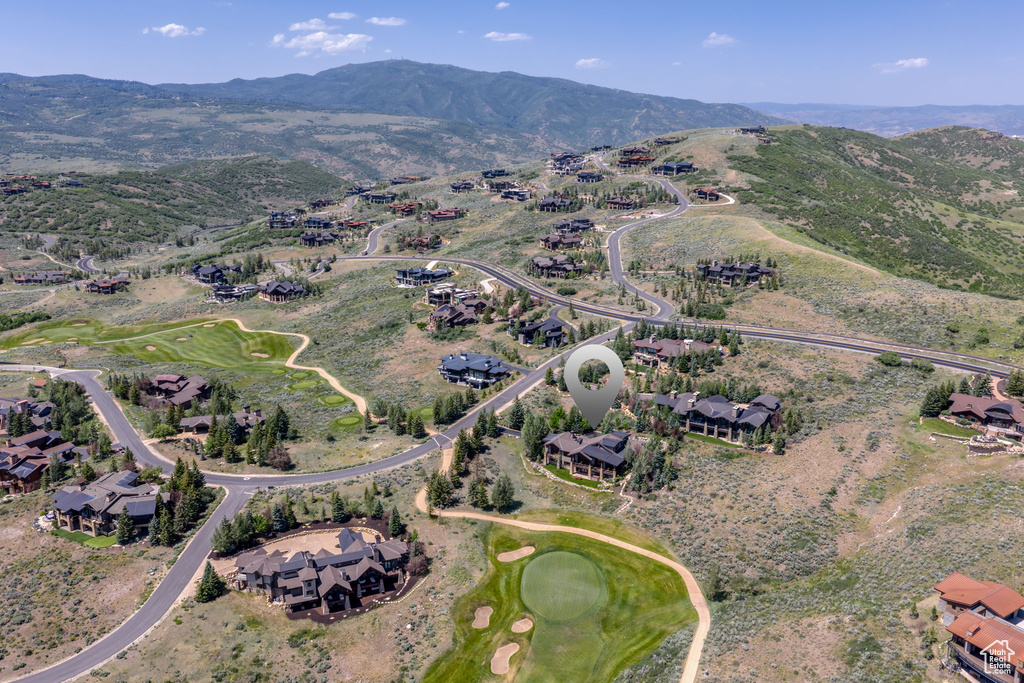 View of property location with nearby suburban area