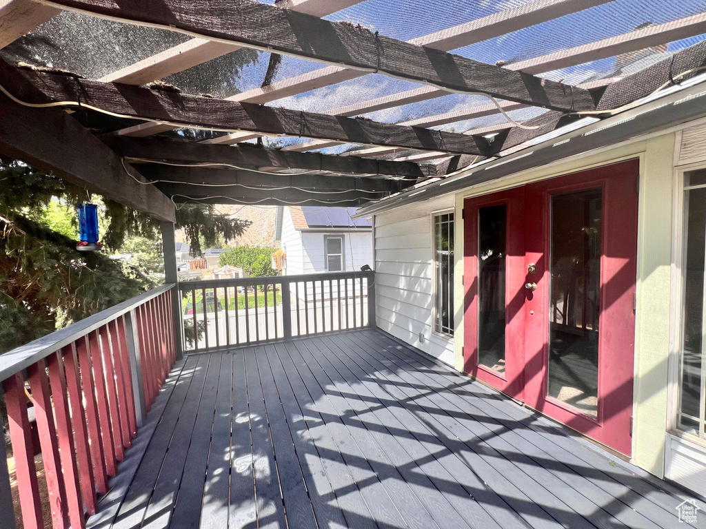 Wooden terrace with a pergola