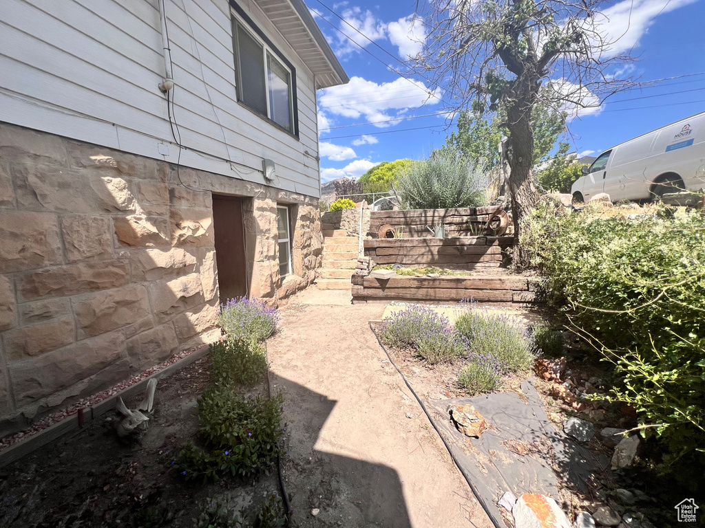 View of yard with stairs