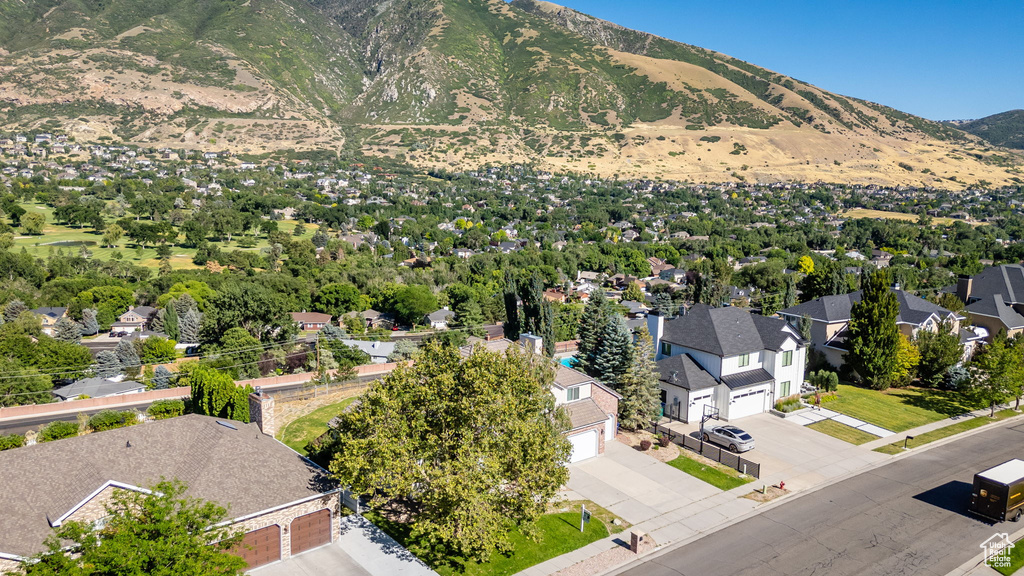 Aerial view of residential area with mountains