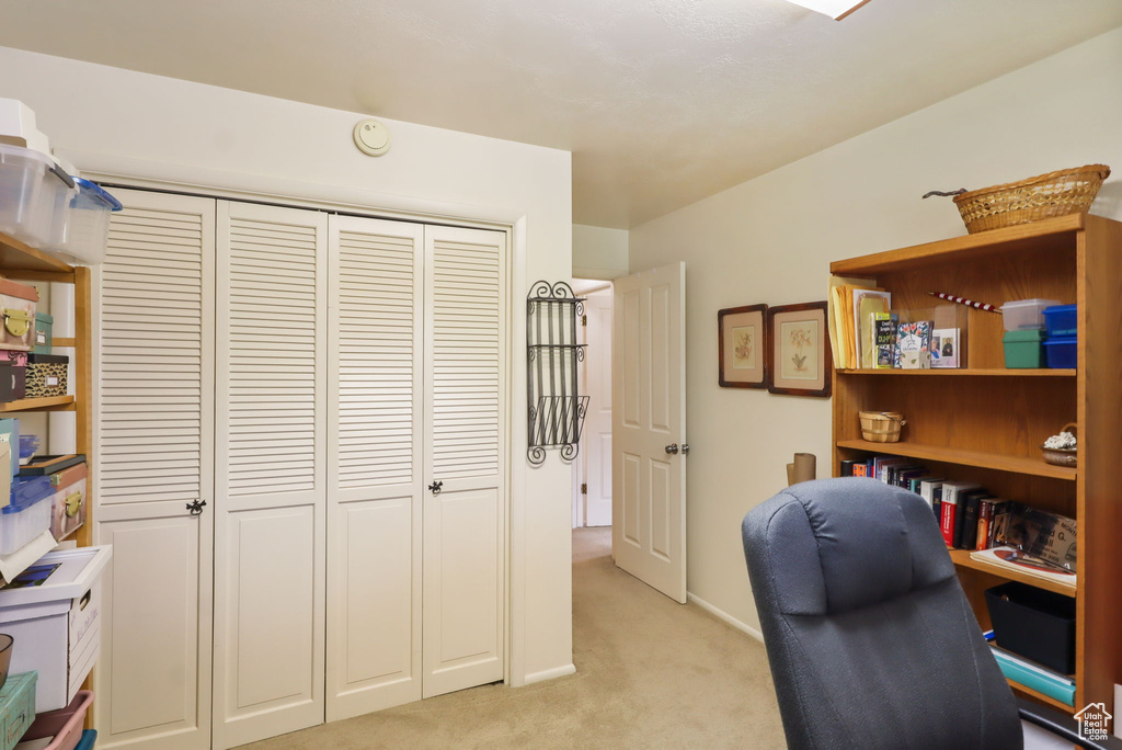 Office featuring light colored carpet