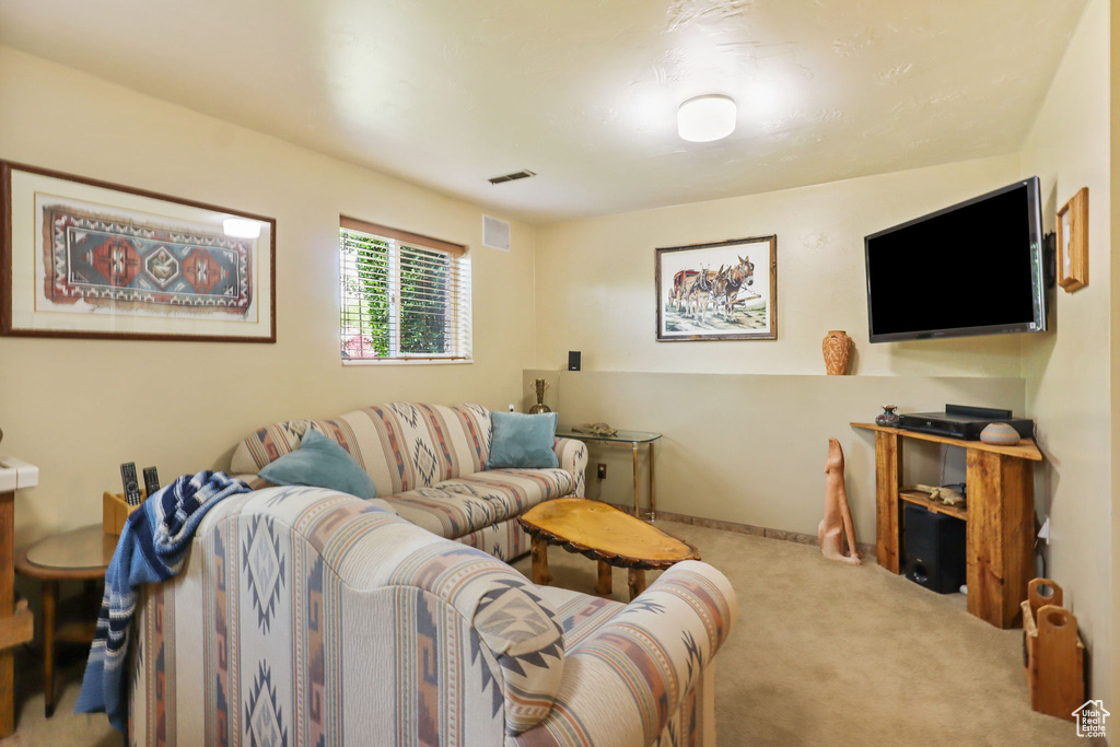 Living area with carpet flooring