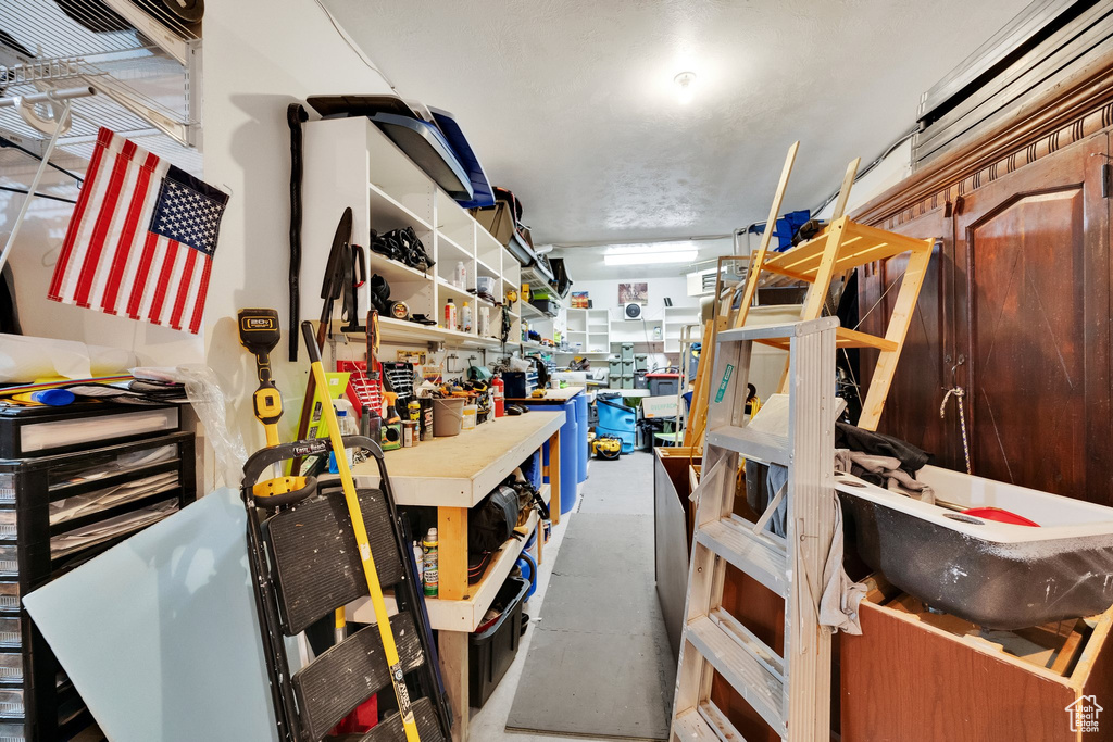 Below grade area featuring a workshop area