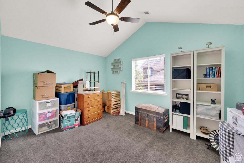 Bedroom featuring lofted ceiling, carpet, and a ceiling fan