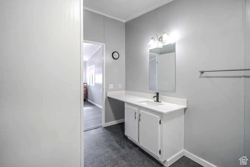 Bathroom with baseboards and vanity