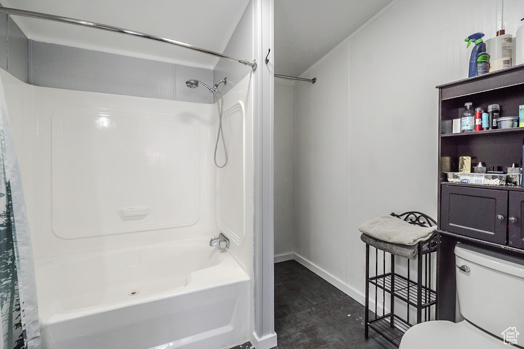 Bathroom featuring shower / tub combo and vanity