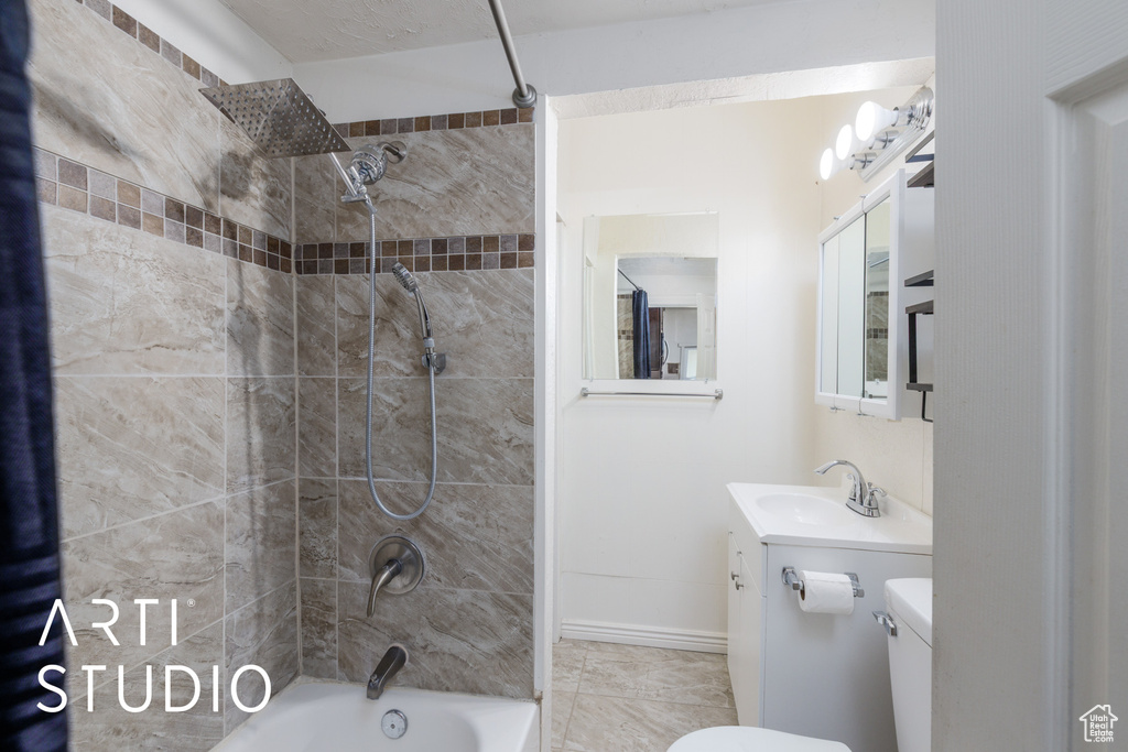 Full bath with  shower combination and vanity