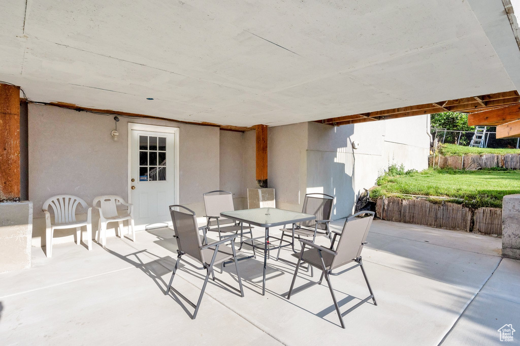 View of patio featuring outdoor dining area