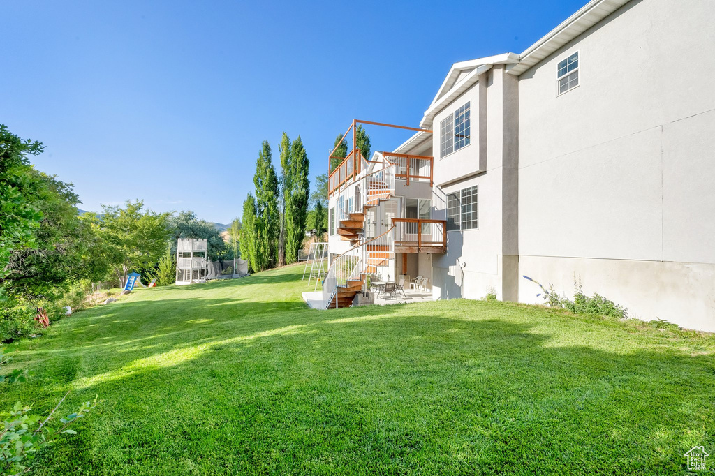 View of green lawn with stairs