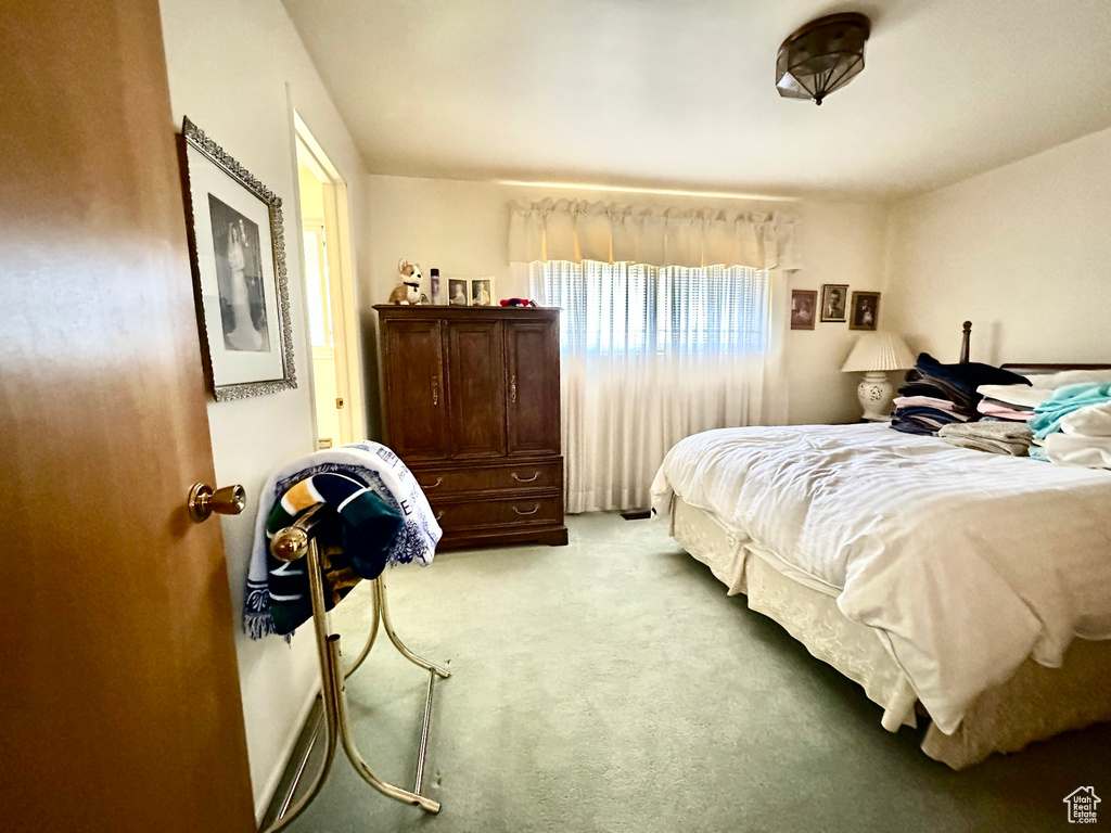 Bedroom featuring carpet