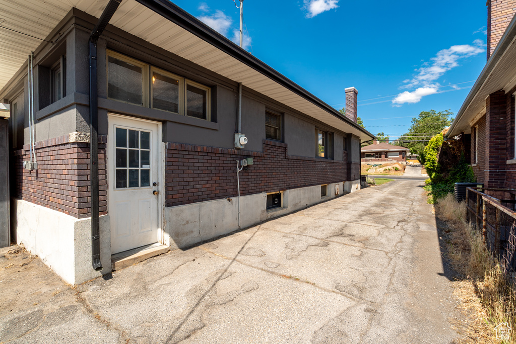View of home's exterior with brick siding