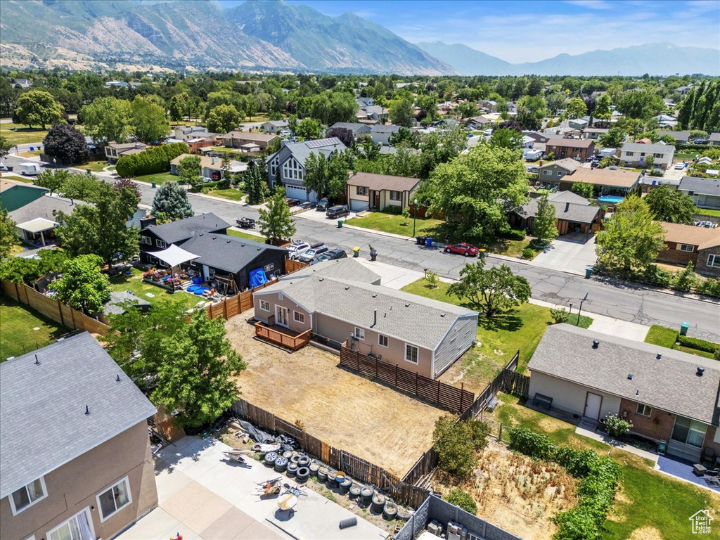 Aerial view of residential area with a mountainous background