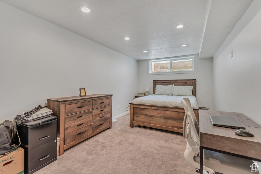 Bedroom featuring recessed lighting and light colored carpet