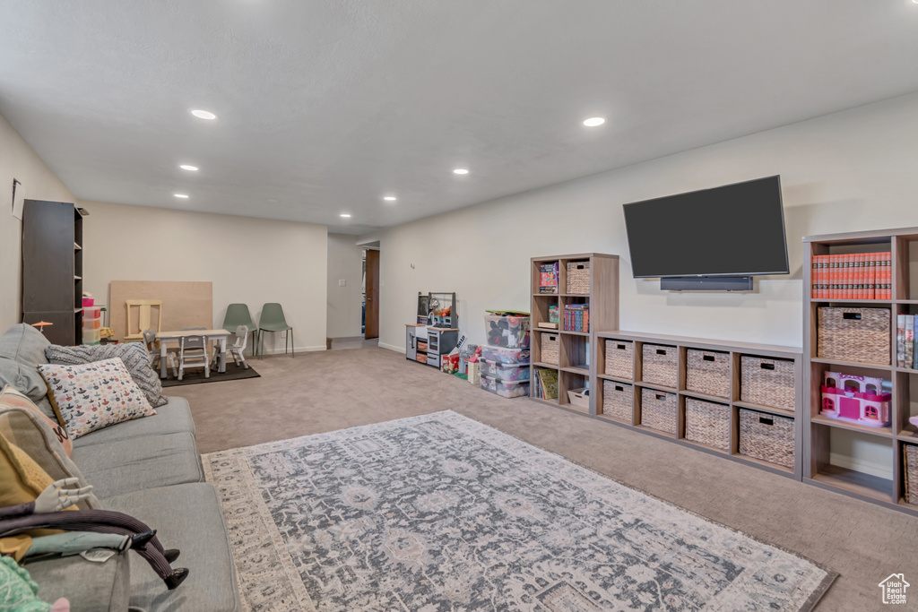 Living room featuring carpet floors and recessed lighting