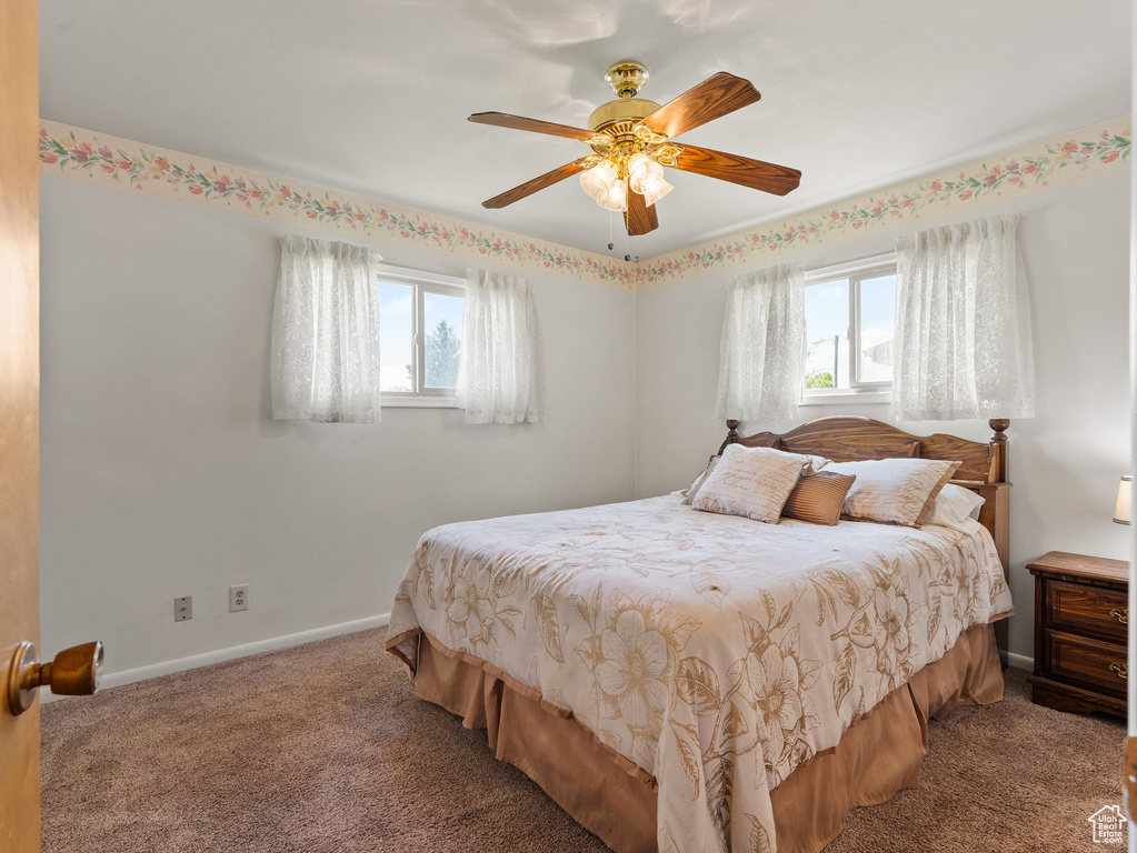 Bedroom with carpet floors and ceiling fan