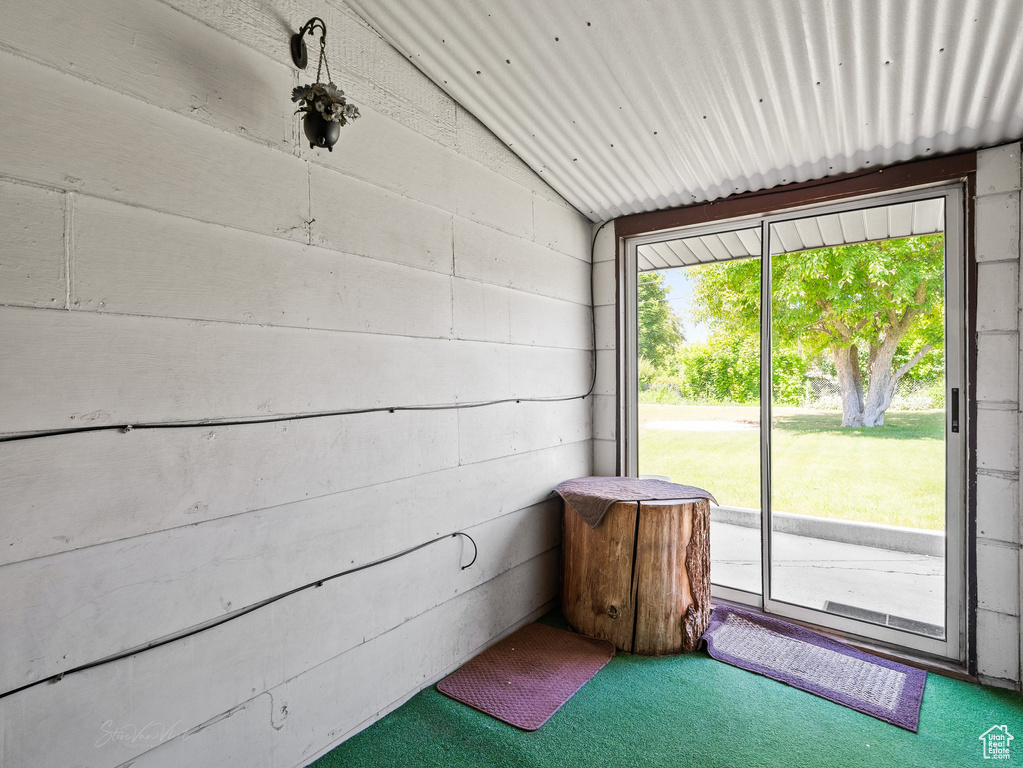 Sunroom with vaulted ceiling