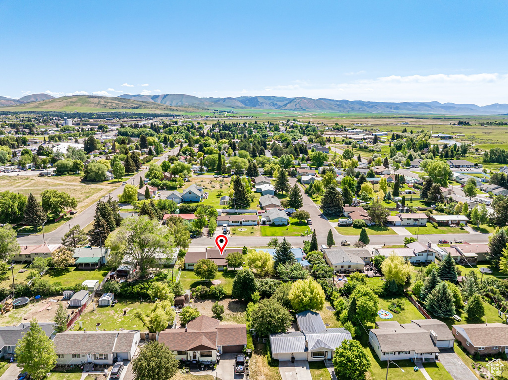 Aerial view of residential area with a mountain backdrop