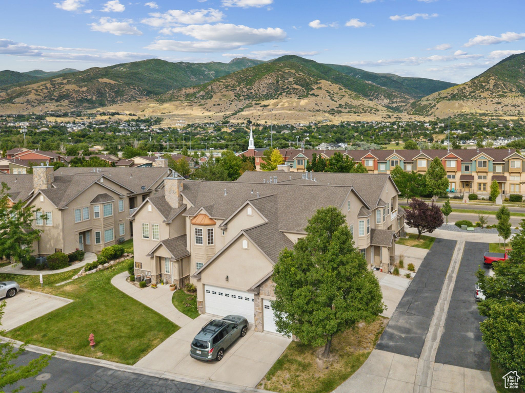 Mountain view featuring nearby suburban area