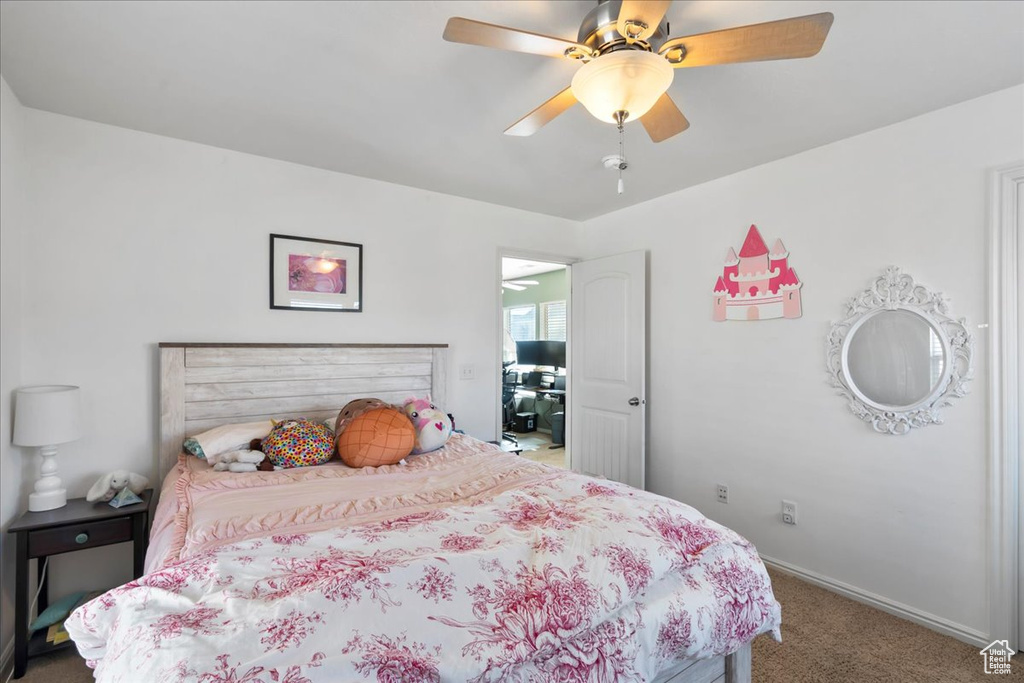 Bedroom featuring carpet floors and a ceiling fan