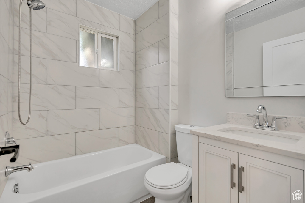 Full bathroom with vanity and shower / bath combination